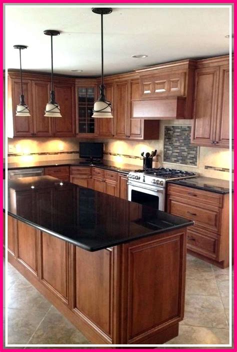 oak cabinets with black stainless steel appliances|kitchen remodels with oak cabinets.